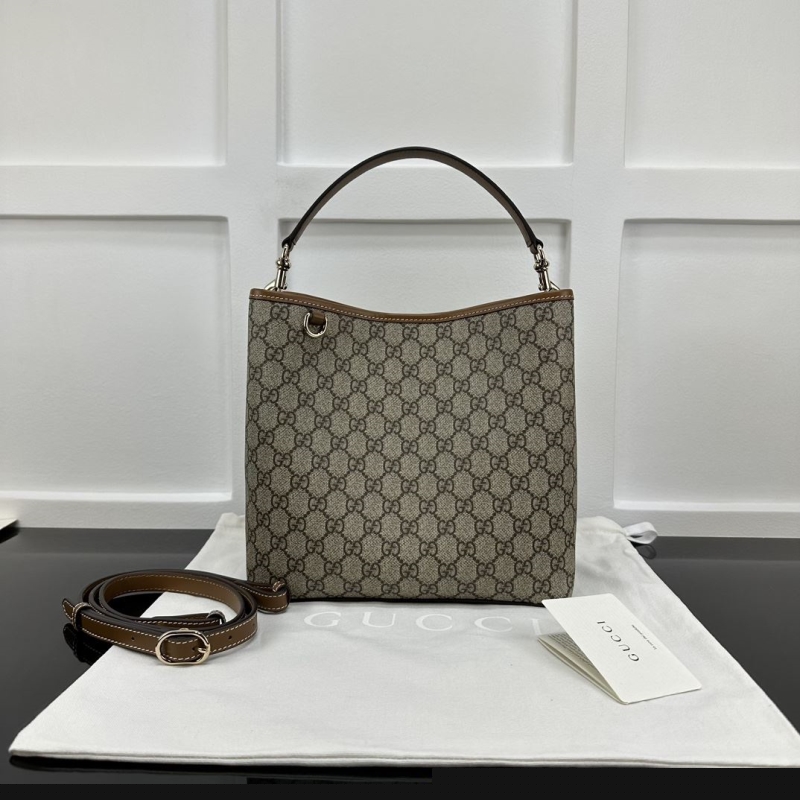 G*u*i top handle bags